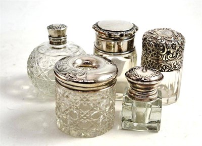 Lot 340 - Five silver-topped jars