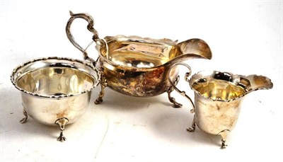 Lot 351 - Silver sauce boat, silver cream jug and sugar bowl