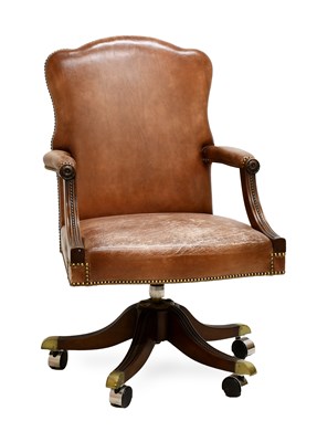 Lot 1359 - A Reproduction Office Armchair, covered in...