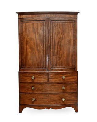 Lot 562 - A Regency Mahogany Bowfront Linen Press, early...