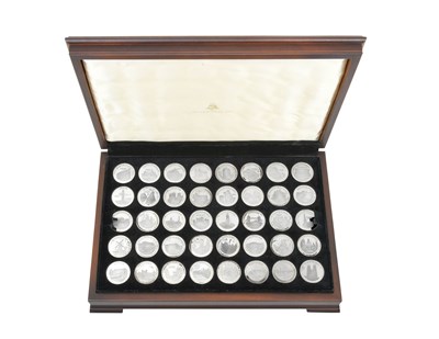 Lot 2242 - A Cased Set of Forty Elizabeth II Limited Edition Commemorative Silver Medallions