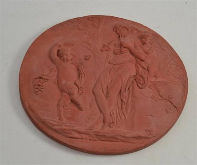 Lot 389 - Circular terracotta plaque