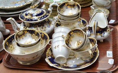 Lot 391 - Blue and gilt part tea service