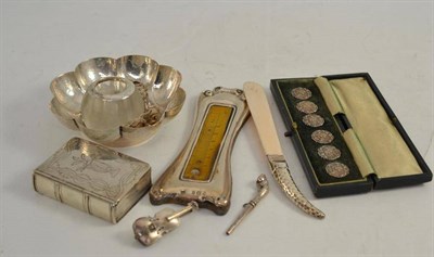 Lot 425 - A silver dish, miniature paper knife, cased buttons, etc