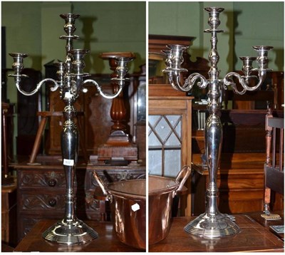 Lot 432 - Pair of plated five light candelabra