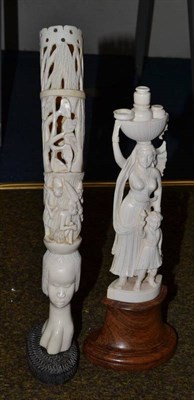 Lot 443 - An Indian carved ivory figure of a woman and an African tusk carving