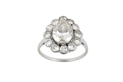 Lot 2006 - A Diamond Cluster Ring the pear cut diamond...