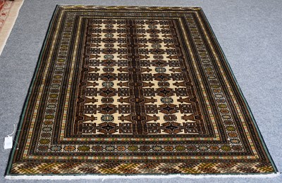 Lot 1235 - "Bukhara" Rug, the wheat field with two...