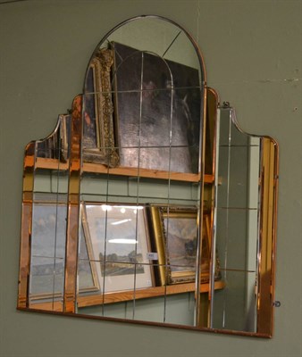 Lot 495 - An Art Deco peach glass skyscraper mirror, 97cm x 95cm