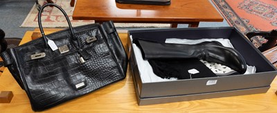 Lot 1153 - Osprey Black Crocodile Style Bag, with printed...