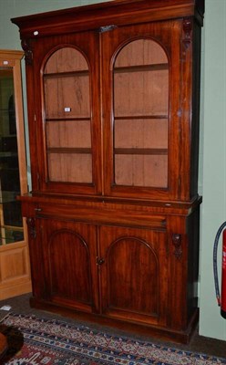 Lot 506 - Victorian mahogany glazed bookcase on cupboard base