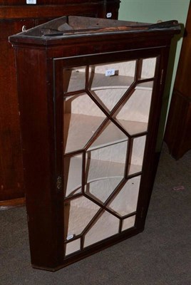 Lot 512 - Mahogany glazed hanging corner cupboard