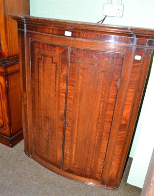 Lot 513 - Mahogany corner cupboard