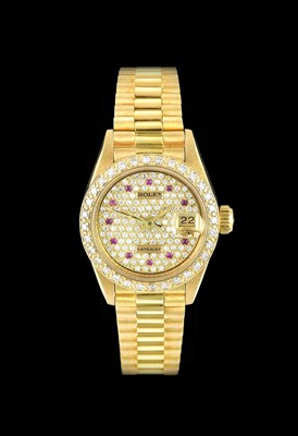 Lot 2294 - Rolex: A Lady's 18 Carat Gold Diamond and Ruby...