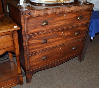 Lot 559 - A late Georgian inlaid mahogany three height chest