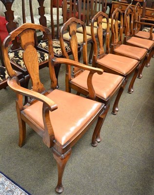 Lot 569 - A set of six walnut dining chairs (4+2)