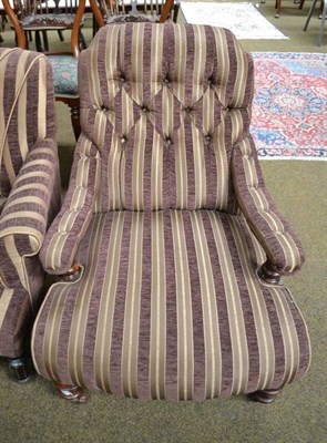 Lot 578 - A late 19th century open armchair on walnut legs