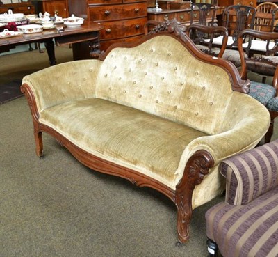 Lot 580 - Carved mahogany velvet upholstered settee