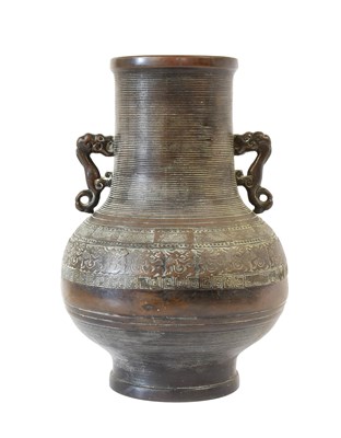 Lot 195 - A Chinese Bronze Hu Vase, in Archaic style,...
