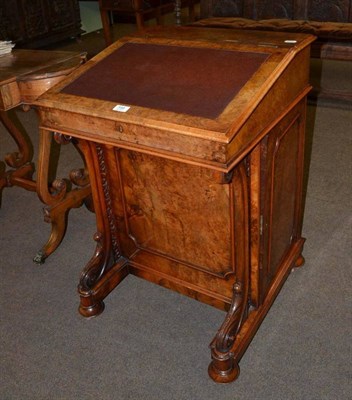 Lot 598 - A Victorian walnut Davenport