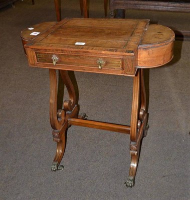 Lot 599 - Regency rosewood sewing table