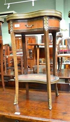 Lot 605 - A marble top two tier single drawer side table with gilt metal mounts