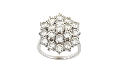 Lot 2036 - A Diamond Cluster Ring the central raised...
