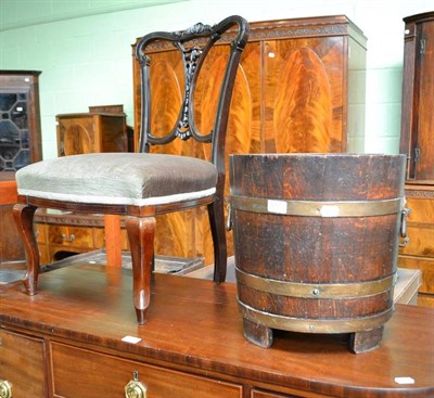 Lot 617 - A brass bound bucket with makers plaque 'R.A.Lister & Co', door stop, a trivet and a chair (4)