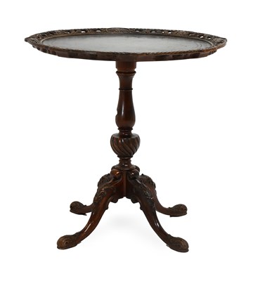 Lot 552 - A Victorian Carved Walnut Tripod Table, late...