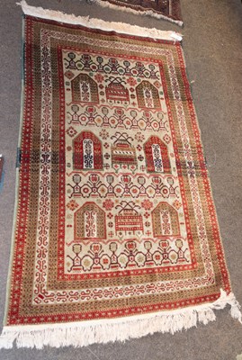 Lot 1251 - Anatolian Rug, the brick red field centred by...