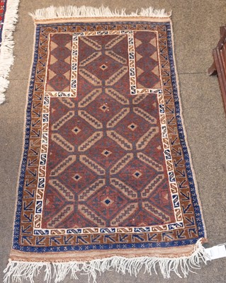 Lot 1251 - Anatolian Rug, the brick red field centred by...