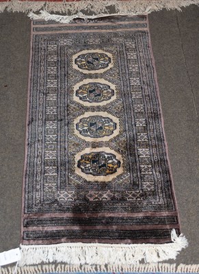 Lot 1251 - Anatolian Rug, the brick red field centred by...