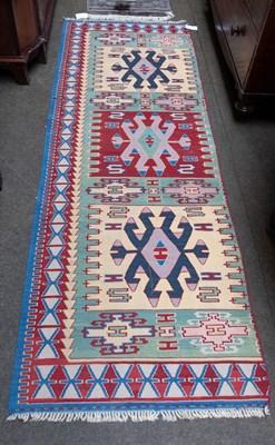 Lot 1251 - Anatolian Rug, the brick red field centred by...
