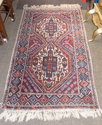 Lot 1251 - Anatolian Rug, the brick red field centred by...
