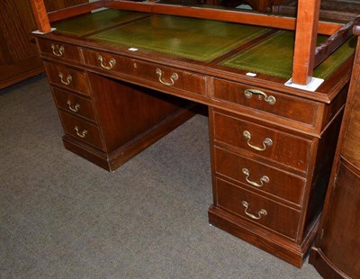 Lot 620 - Reproduction mahogany partners desk in the George III style