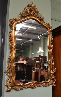 Lot 630 - A reproduction gilt framed mirror