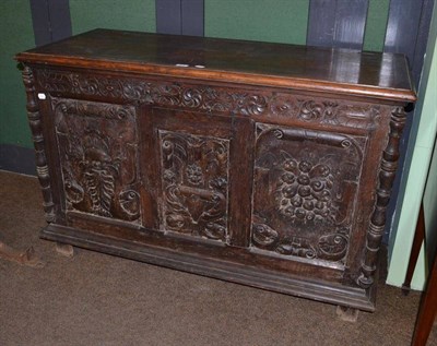 Lot 631 - A French carved oak coffer