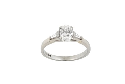 Lot 2098 - A Platinum Diamond Ring the oval cut diamond...