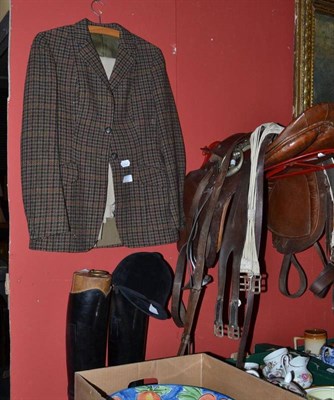 Lot 668 - A collection of horse riding equipment including a pair of leather boots, (size 5.5-6), a...