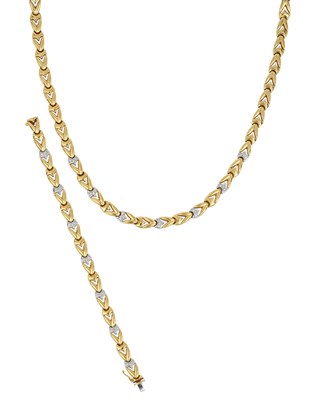 Lot 2025 - An 18 Carat Gold Diamond Necklace and Bracelet...