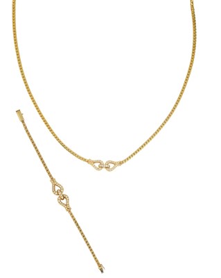 Lot 2003 - An 18 Carat Gold Diamond Necklace and Bracelet...