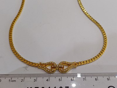 Lot 2003 - An 18 Carat Gold Diamond Necklace and Bracelet...