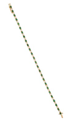 Lot 2125 - An Emerald and Diamond Line Bracelet...