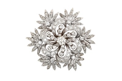Lot 2107 - A Diamond Brooch the central round brilliant...