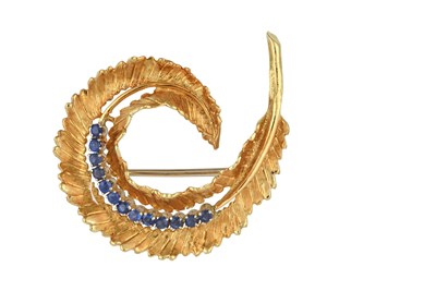 Lot 2321 - An 18 Carat Gold Sapphire Brooch the yellow...