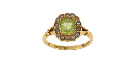 Lot 2470 - An 18 Carat Gold Peridot and Split Pearl Ring...