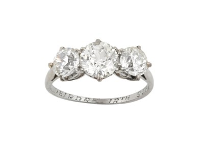 Lot 2027 - A Diamond Three Stone Ring the graduated old...