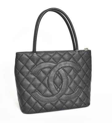 Lot 1018 - Chanel Black Caviar Leather Medallion Quilted...