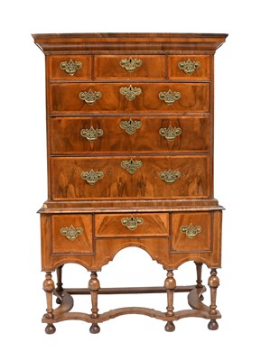 Lot 451 - A Figured Walnut and Featherbanded Chest on...