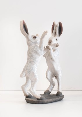 Lot 545 - A John Hine Pottery Raku Boxing Hare Group,...